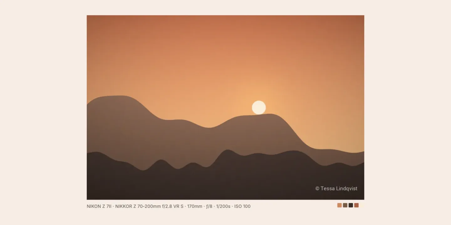 A project page from the sample portfolio: a mountain photograph at sunset with a small copyright watermark in the corner, captioned with the camera, lens, focal length, aperture, shutter speed and ISO, and five color swatches. The page behind it is tinted to match.