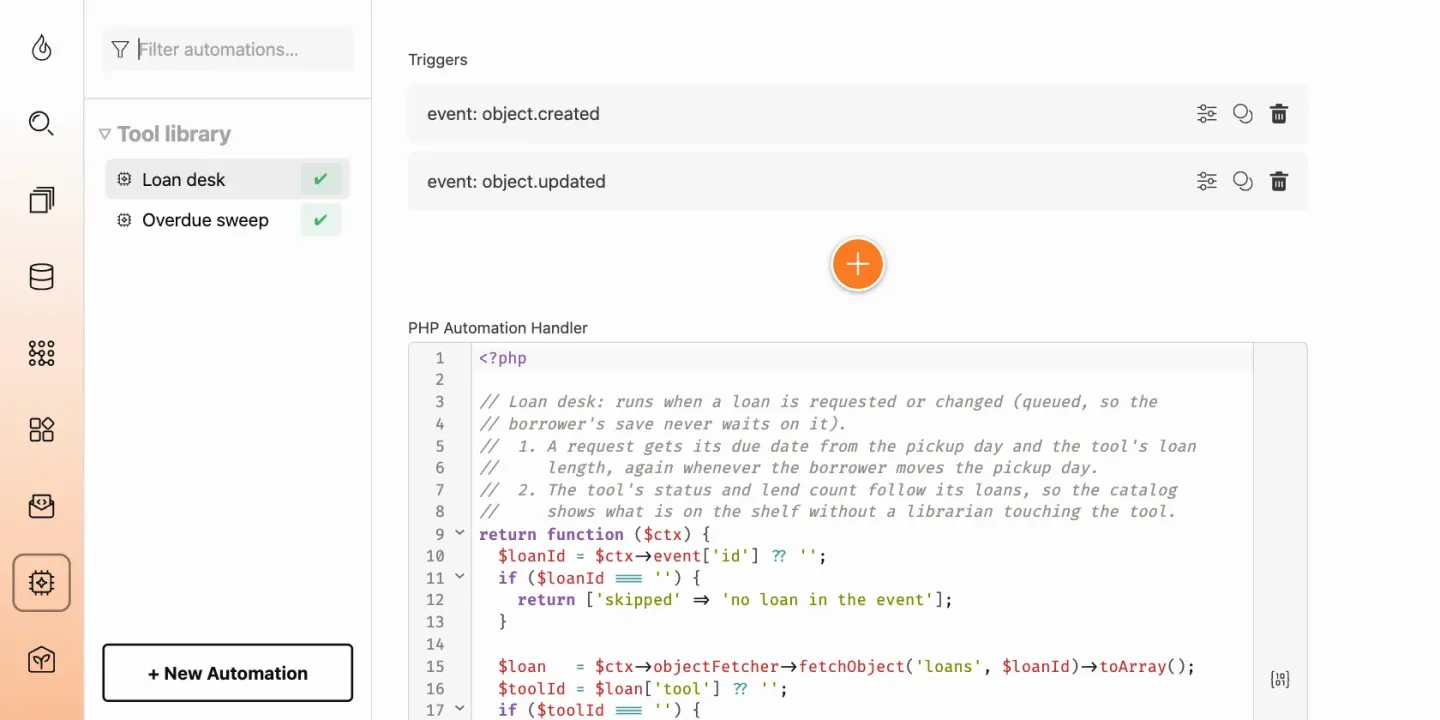 The Loan desk automation in the Total CMS admin: two event triggers, object created and object updated, and the start of its PHP handler.